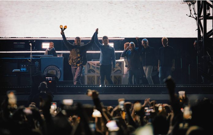 Noel and Liam Gallagher performing with Oasis at Cardiff Principality Stadium on Friday July 4, 2025. Credit: Big Brother Recordings 